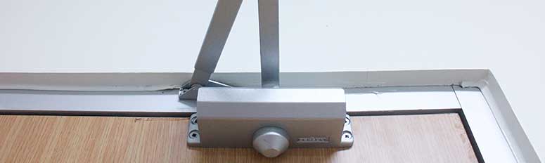 Concealed door closers