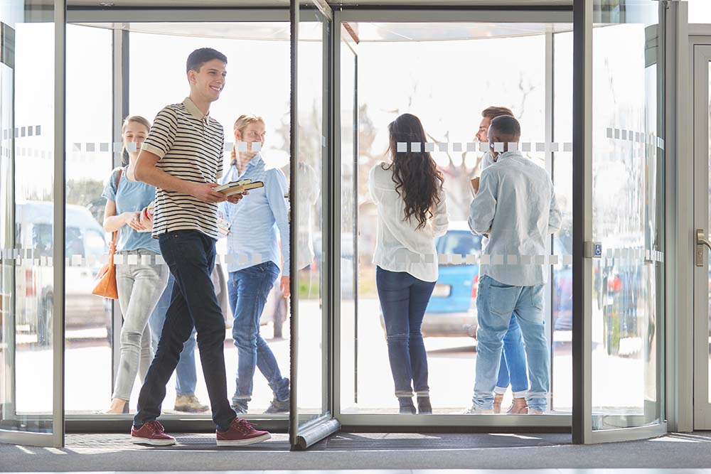 Revolving Doors Improve Traffic Flow