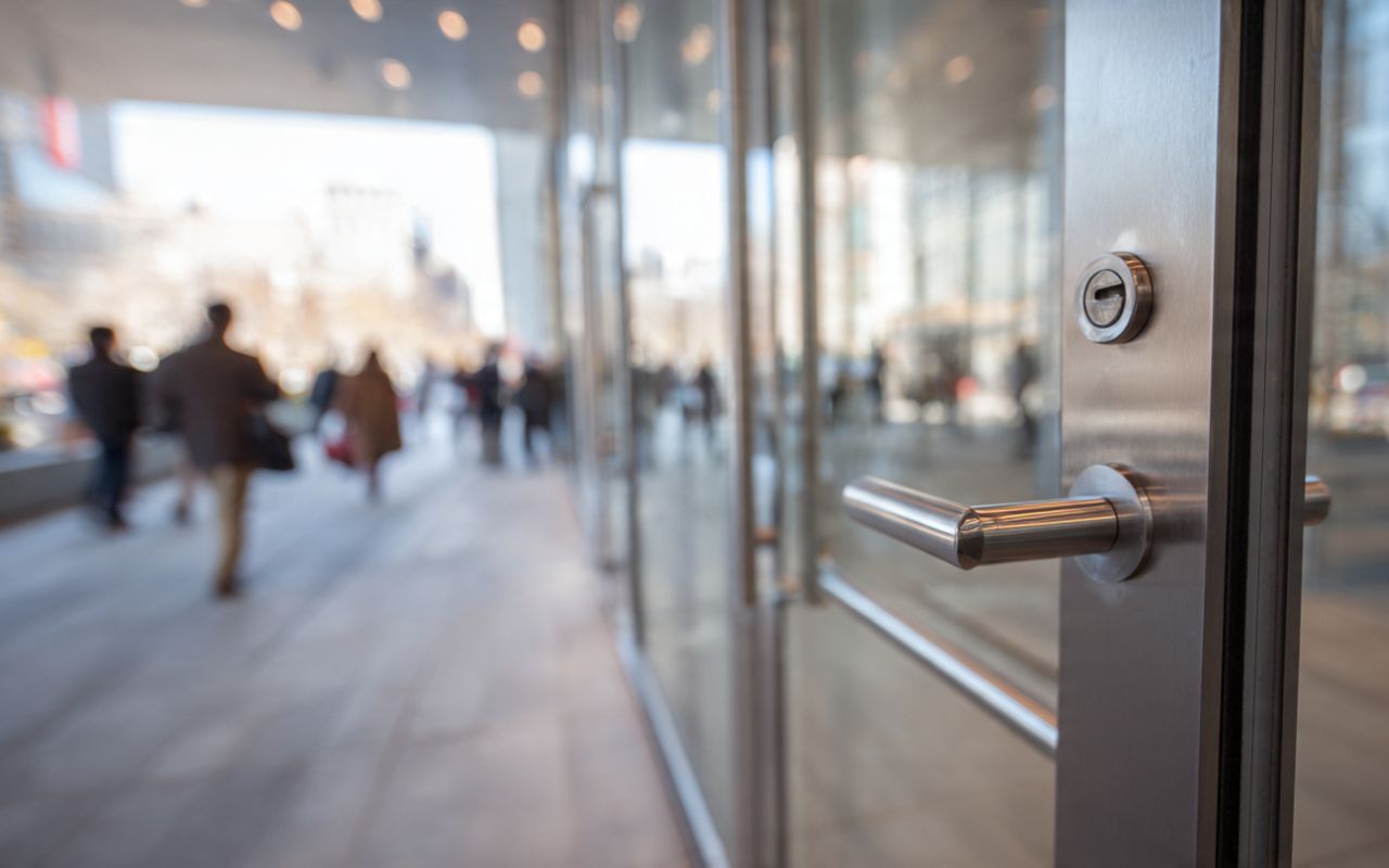 Commercial door hardware in Chicago at a busy building entrance