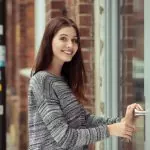 girl open a commercial door