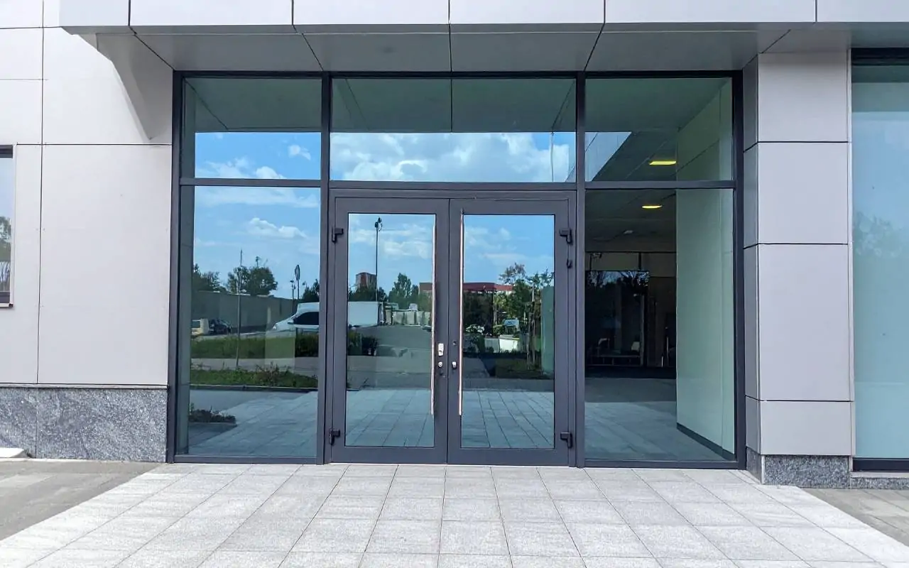 Maintenance expert checking when to replace commercial door hardware