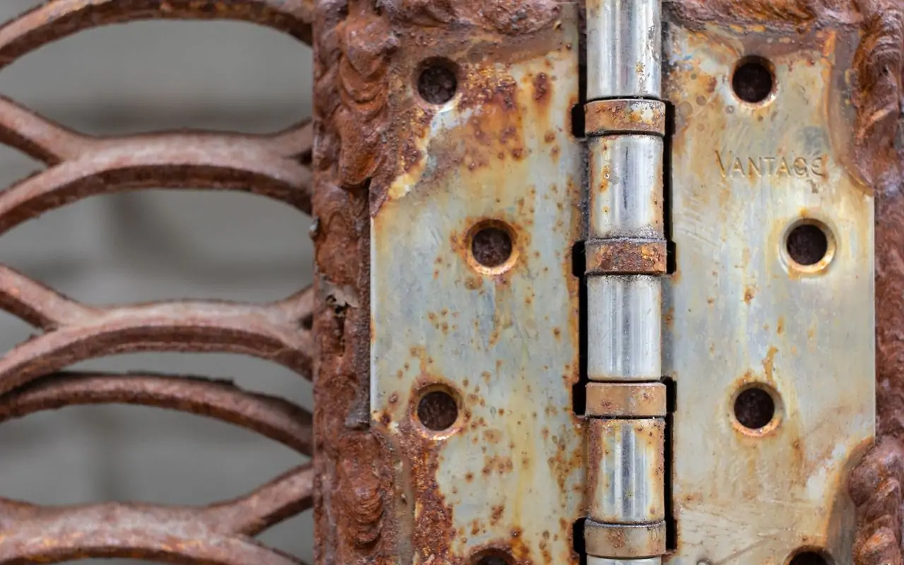Hollow metal door rust repair in Chicago during a detailed steel frame inspection.
